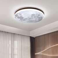 La lampe lunaire de style bois de noyer est un plafonnier LED simple, moderne et élégant dans le salon. Il est doté d'un poêle à bois
