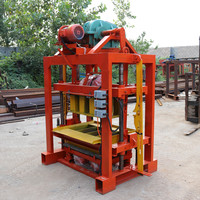 Nouveau modèle de machine manuelle de fabrication de blocs en ciment pour murs creux machine à fabriquer des blocs en stock maxi au Gabon en Ouganda