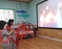Machine de jeu interactive de projection d'extincteur, simulateur virtuel de lutte contre l'incendie, jeu de projection murale pour musée scientifique