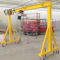 Mini-grue portique compacte à 4 roues pour atelier, conception mobile avec capacité de levage personnalisable