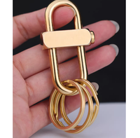 Porte-clés en laiton avec petit fermoir coulissant ovale à bouton-poussoir latéral pour verrouillage