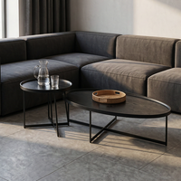 Ensemble de tables basses ovales modernes noires avec plateau en bois grainé et pieds en métal pour salon