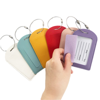 Vente en gros Longes fixes en cuir PU multicolores Étiquettes à bagages de luxe en métal Étiquettes d'identification pour cartes d'embarquement Stock de cartes