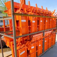Machine à fabriquer des blocs en interverrouillage Dohero, machine à mouler des briques en argile manuelle avec une longue durée de vie et une garantie de 2 ans