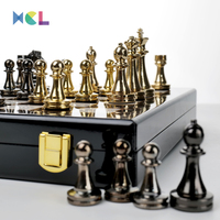 XCL vente en gros d'échecs en métal de haute qualité or noir 29*29cm en alliage de zinc jeux d'échecs ensemble marbre motif échiquier