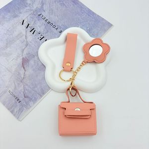 Mini porte-monnaie porte-clés en forme de <span class=keywords><strong>sac</strong></span> <span class=keywords><strong>à</strong></span> dos, breloque de <span class=keywords><strong>sac</strong></span> de créateur, mignon, en cuir PU, pochette <span class=keywords><strong>à</strong></span> monnaie, pendentif pour <span class=keywords><strong>sac</strong></span> <span class=keywords><strong>à</strong></span> main avec miroir floral - Product Image 6