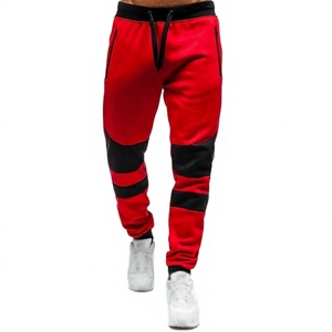 Pantalon de survêtement mi-long léger pour homme, 100 % coton, coloris rouge et noir, taille élastique avec cordon de serrage, poches latérales, style décontracté - Product Image 1