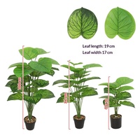 Bouquet de plantes artificielles en PVC souple de style nordique pour la décoration du salon, comprenant des palmiers Areca, des plantes du paradis et des bananiers du voyageur en pot.