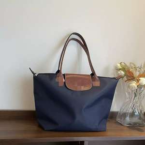 Long-xhonp <span class=keywords><strong>M</strong></span>-formaat mode grote capaciteit waterdichte nylon schoudertas/crossbody tas met letterpatroon voor unisex, draagbaar voor de winter - Product Image 1