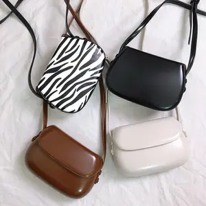 New 2023 Fashion Horseshoe Bag Fashion Advanced Texture Mini Zebra Women's Bag Solid Color Versatile Mobile Phone Shoulder Bag