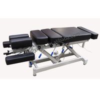 Table chiropratique électrique pour traitement de physiothérapie