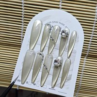Vente en gros OEM ODM Faux ongles à presser faits main effet œil de chat, avec strass 3D et dentelle, longs, forme stiletto, en acrylique, ensemble de faux ongles