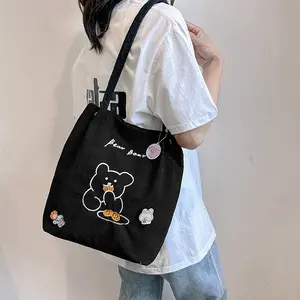 Venta al por mayor nueva tendencia de moda Botón de hombro personalizado mujer bolsa de pana