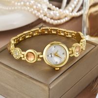 Montre à quartz pour femmes de luxe avec bracelet en or, bijoux colorés et élégants pour femmes, bracelet en acier inoxydable