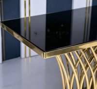Table de réception de mariage de luxe avec base en acier inoxydable doré et plateau en verre noir