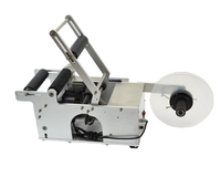Machine d'étiquetage semi-automatique MT-50 pour bouteilles rondes, idéale pour l'étiquetage des autocollants.