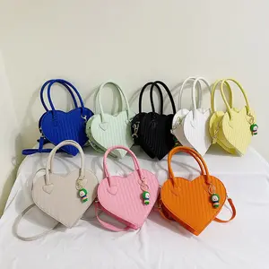 çanta kadınlar sling satış Suppliers-Moda kadın çanta sling 2022 sıcak satış bayanlar omuz çantaları ve çanta pu deri toptan özel kalp şekilli tote çanta