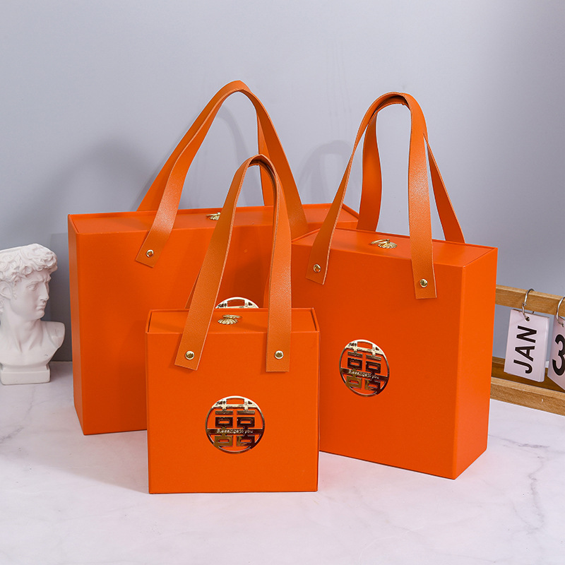 Caja de regalo con cajón y diseño de doble felicidad naranja.