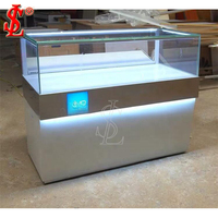 Maßgefertigte Holzmaserung LED-Beleuchtete Handy-Glasvitrine Gehärtetes Glas Mobiltelefon-Ausstellungsvitrine für Elektronik-Einzelhandel