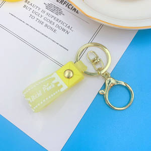 Cordon de poignet court avec boucle de clé en <span class=keywords><strong>pvc</strong></span> en caoutchouc <span class=keywords><strong>souple</strong></span> <span class=keywords><strong>transparent</strong></span> bon marché de couleur bonbon avec porte-clés en métal doré - Product Image 6