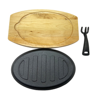 Vente en gros de poêles à fajita en fonte à fond plat avec poignée et assiette en bois