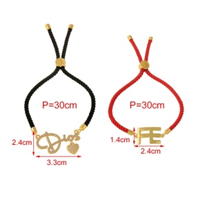 Set di 2 braccialetti Asu in corda nera e rossa con ciondoli dorati 'Dios' e 'FE', gioielli regolabili - Product Image 4
