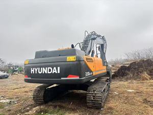 Excavatrice sur chenilles d'occasion Hyundai, machine de construction jaune - Product Image 2