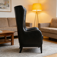 Fauteuil classique en cuir noir à dossier haut, design vintage, confortable, pour salon, bureau ou salle d'étude