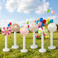 Panneau publicitaire gonflable de Noël en forme de sucette, motif macaron multicolore à rayures spirales, pour la décoration de scènes de vacances sur le thème des desserts