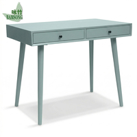 Bureau d'écriture moderne en bois écologique bleu mat avec deux tiroirs de rangement et pieds coniques pour chambre et bureau à domicile