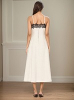 Robe longue d'été unique en dentelle tissée à fines bretelles sans manches pour femme