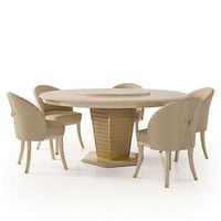 Table ronde en céramique à une seule jambe et chaises en cuir pour salle à manger