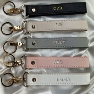 Porte-clés de voiture en cuir PU personnalisé avec logo d'usine, cordon anti-perte DIY, accessoires, cadeau, pendentif - Product Image 1