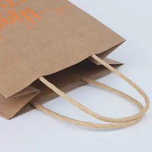 Promocional reciclado impreso su propio logotipo bolsa de papel marrón Kraft regalo artesanía compras gracias bolsa de papel con asas