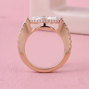 Anillo de compromiso solitario de diamante talla oval East West con halo oculto y banda pavé para joyería fina nupcial moderna - Product Image 1