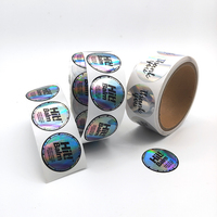 Étiquettes d'emballage en rouleau à bordure laser holographique imprimées numériquement aux couleurs vives avec vernis mat pour sacs de vêtements de boutique