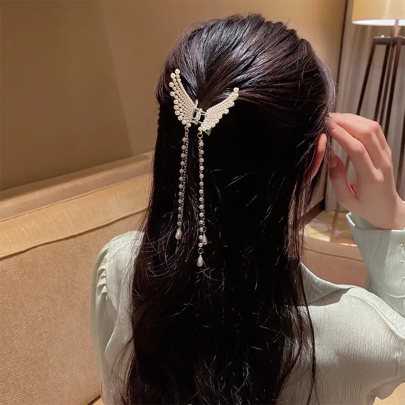 Personalità di alta qualità elegante e adorabile tutto con accessori per capelli a farfalla di perle per le donne