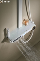 Nouvelle conception : Ensemble de douche multifonctionnel avec écran numérique, touches piano, cascade, massage lombaire, éclairage ciel étoilé et finition blanc bronze.
