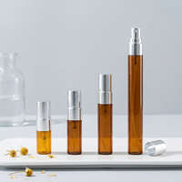 Vente en gros de flacons de parfum ronds en verre ambré de 2 ml/3 ml/10 ml avec pompe pulvérisatrice noire/dorée/argentée sérigraphiée et diffuseur à bâtonnets