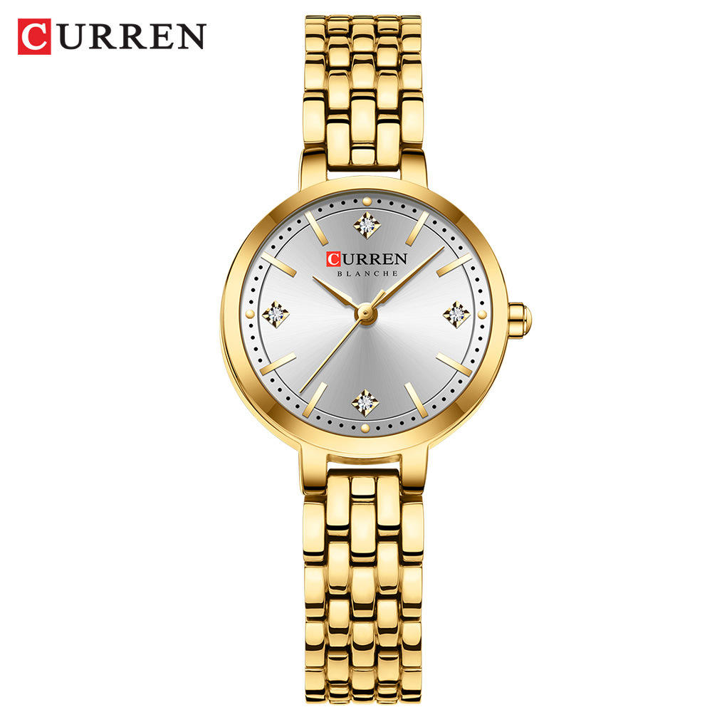 White dial gold strap