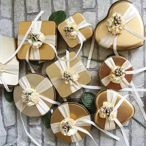 Commercio all'ingrosso piccola menta dorata a forma di cuore di san valentino in metallo di latta di cioccolato caramella scatola dolce con nastro di fiori