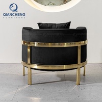 Fauteuil inclinable de salon en velours noir foncé pour chambre d'hôtel, avec coussins