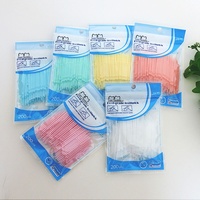 Vente en gros de produits publicitaires compostables personnalisés Brosse interdentaire jetable pour fruits par voie orale Cure-dents en plastique menthe à bas prix