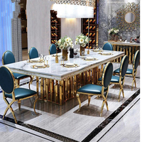 Ensemble de table à manger moderne de luxe en marbre et acier inoxydable doré pour hôtel et usage domestique