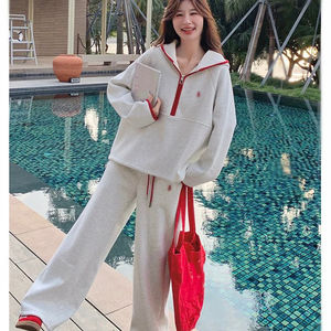 Set Micro ricamato rosso con taglio colorato Casual da donna primavera 2025: felpa oversize con cappuccio e pantaloni a gamba larga - Product Image 1