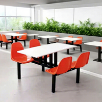 Ensemble table et chaises modernes et minimalistes en acier inoxydable pour 468 personnes, idéal pour les cantines scolaires, d'usine et les cafétérias.