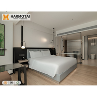 Ensemble de meubles de chambre d'hôtel en bois exclusif, lit luxueux, canapé, table à manger, chaises, rangement pour hôtels et complexes hôteliers modernes