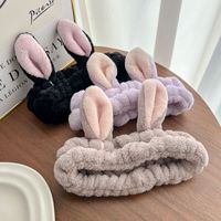 Serre-tête élastique en flanelle douce antidérapant avec oreilles de lapin pour femme, idéal pour le lavage du visage, vente en gros, style européen et américain