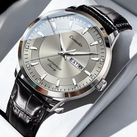 Montre à quartz pour homme, style mécanique, bracelet en acier inoxydable argenté, double calendrier, index diamantés, montre-bracelet décontractée et professionnelle