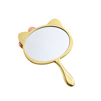 Miroir de maquillage de poche pliable portable mini en forme ovale avec cadre en plastique et logo de chat personnalisé pour une utilisation en extérieur